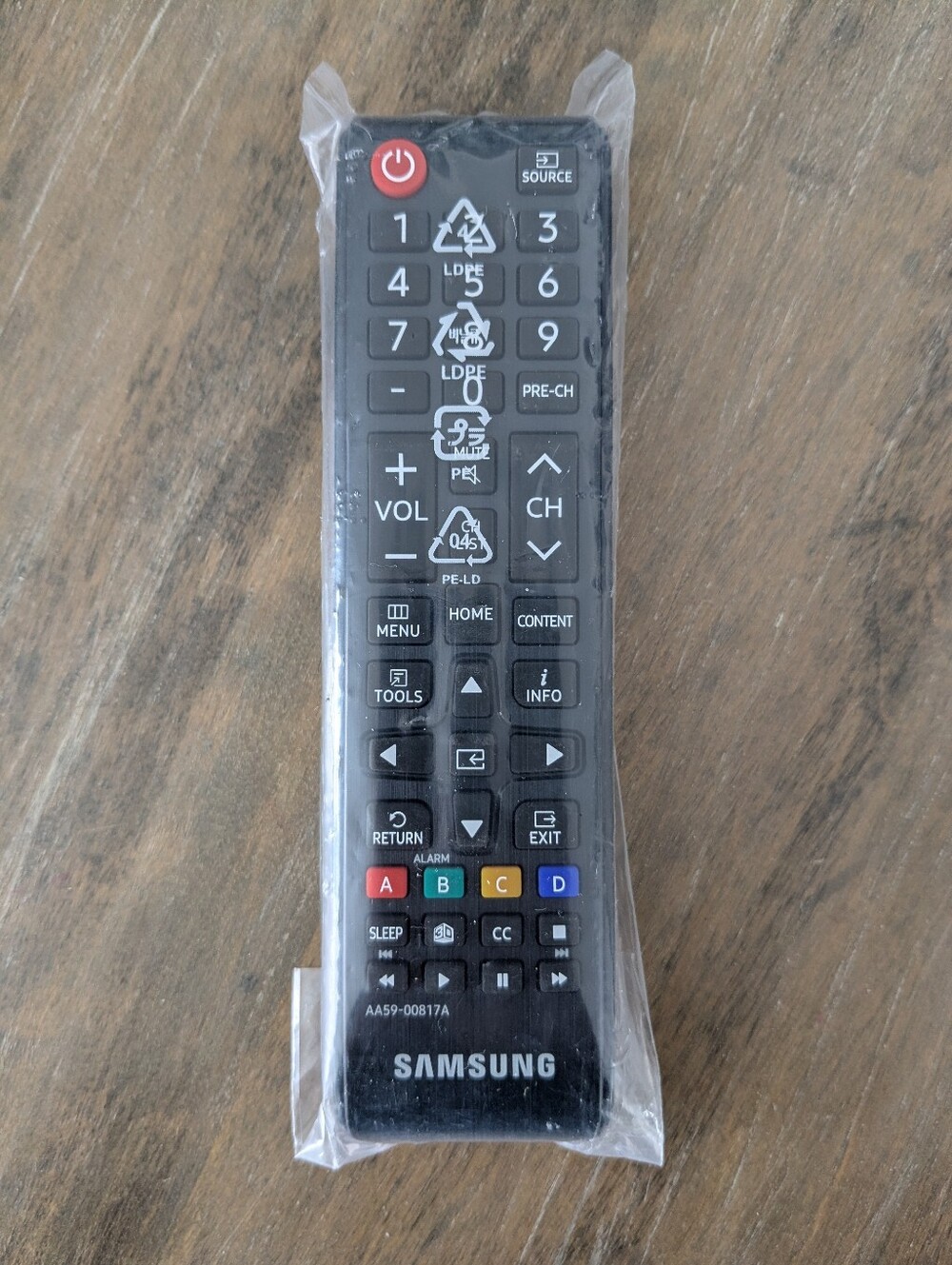 Samsung Black Remote with Red, Green, Yellow and Blue Shortcut Buttons